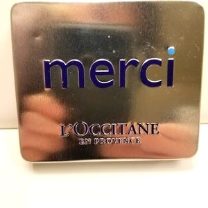 #856T L'Occitane Siver-tone Merci Tin